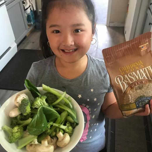 Kid with recipe ingredients