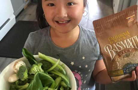 Kid with recipe ingredients