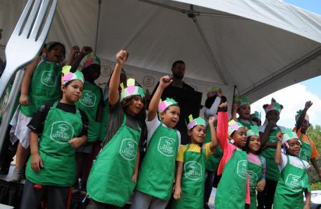 Kids doing veggie cheer - photo by Adam Gottlieb