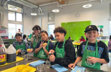 Group photo of students with program educator. 