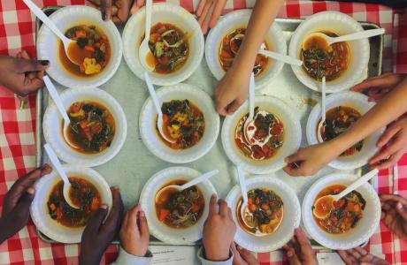 bowls of rainbow soup on a tray