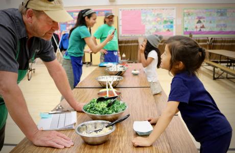 Rick Mahan with a Food Literacy Center kid