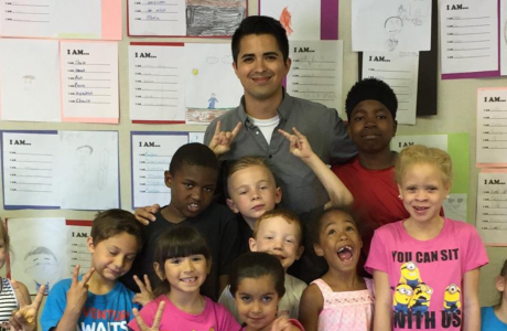 Isaac with students