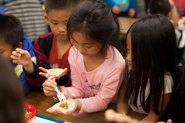 Girl making dumplings