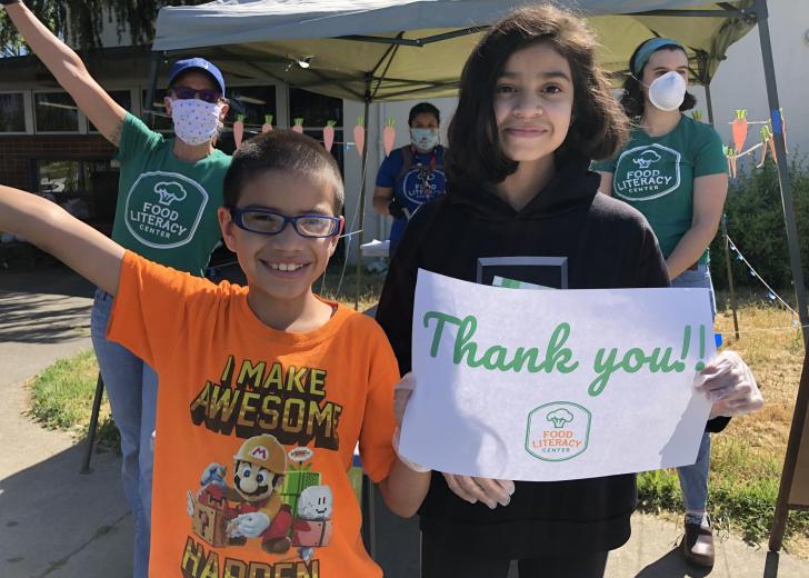 Kids with thank you sign