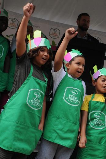 Kids doing veggie cheer