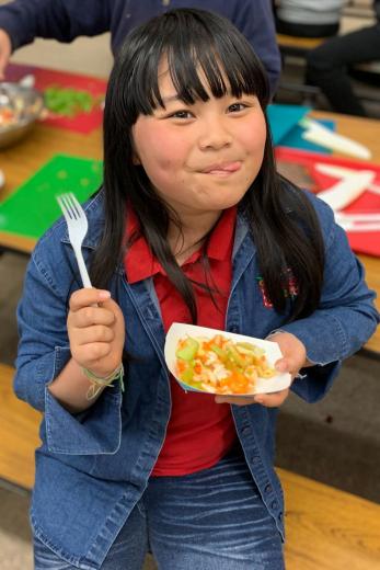 Girl eating recipe