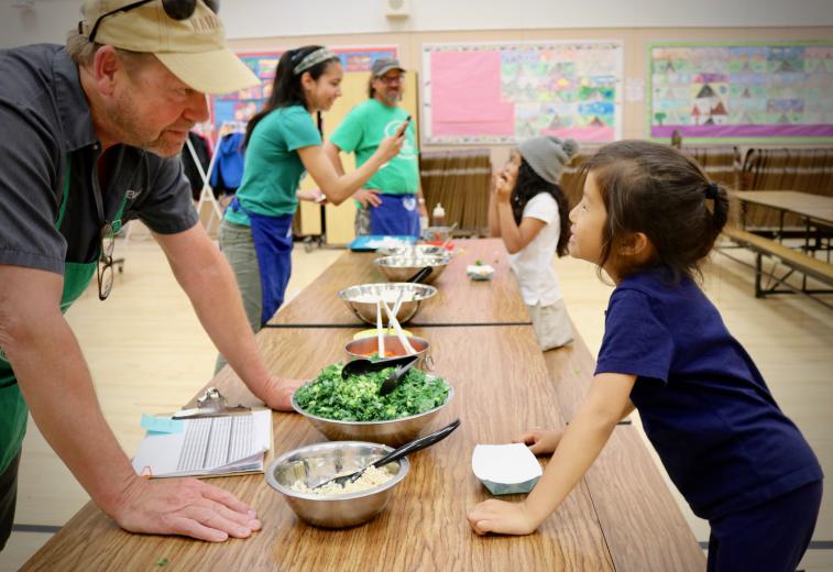 Rick Mahan with a Food Literacy Center kid